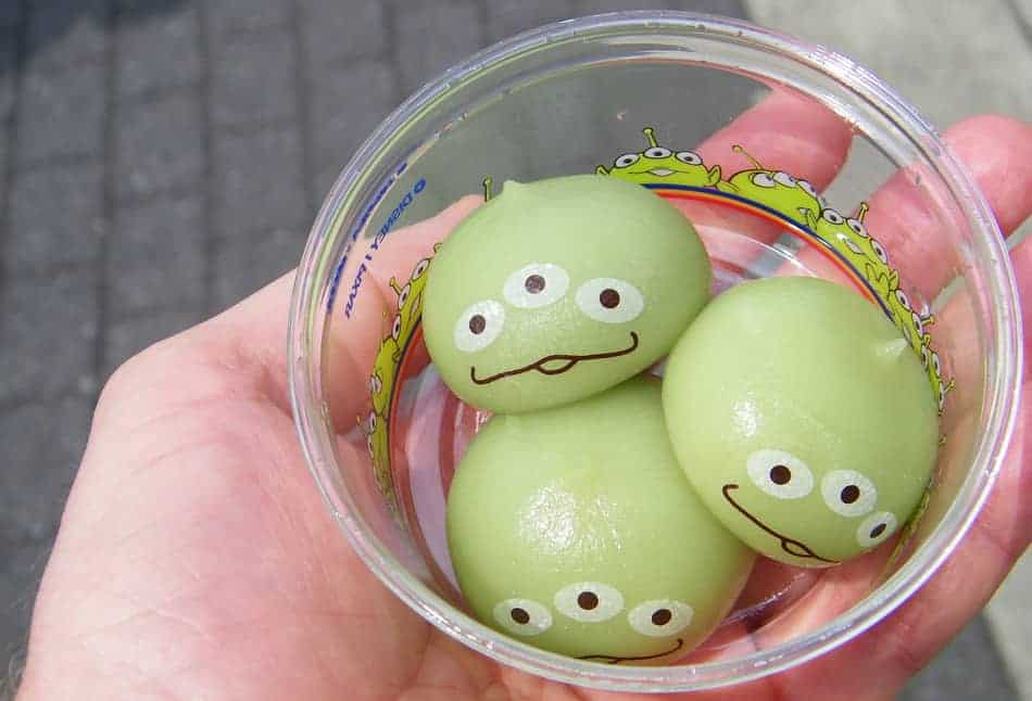 Green strange balls in a cup. Food in Tokyo!