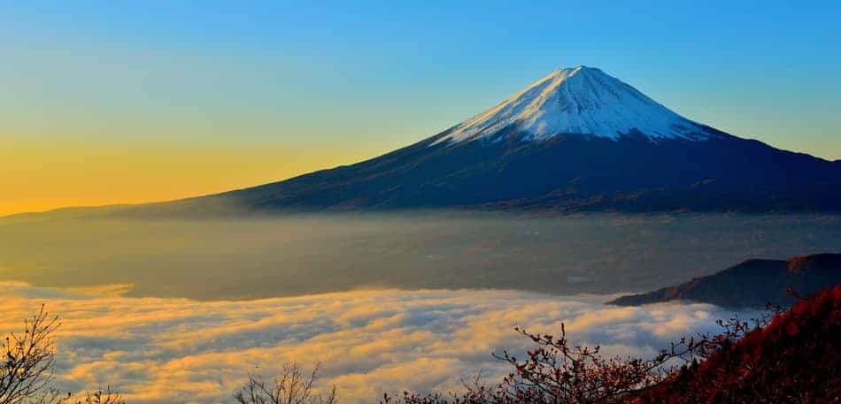 Mount Fuji surrounded by clouds