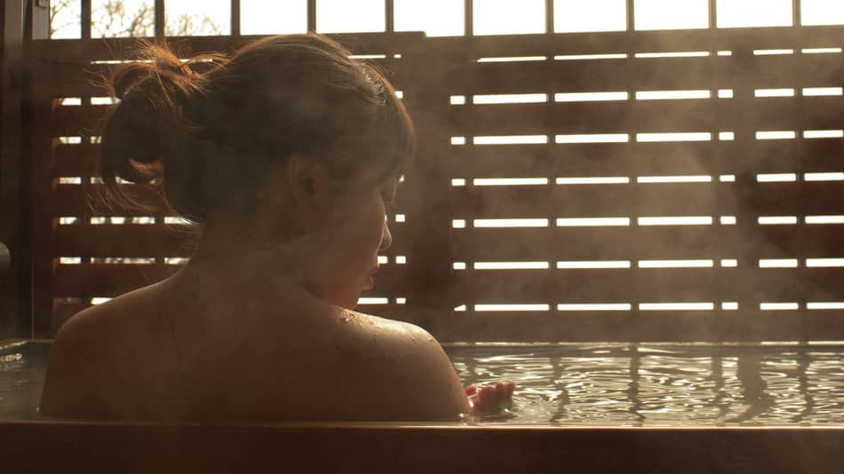 Lady in a hot bath in Japan