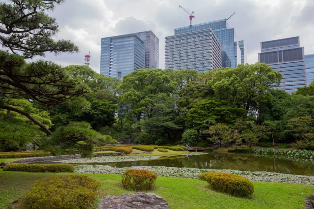 A photo of Tokyo Imperial Palace with Tokyo skyline in the background.